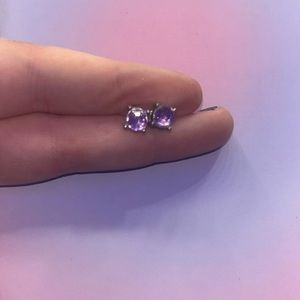 silver earrings with purple gem